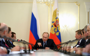 Russia's President Vladimir Putin (C) chairs a government meeting in his Novo-Ogaryovo residence, outside Moscow on March 5, 2014. Western and Russian leaders headed today into a day of diplomatic wrangling over the Ukraine crisis, a day after US President Barack Obama warned Moscow was not 'fooling anybody' over its role in Crimea. AFP PHOTO/ RIA-NOVOSTI/ POOL/ ALEXEY DRUZHININ (Photo credit should read ALEXEY DRUZHININ/AFP/Getty Images)